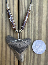 Load image into Gallery viewer, 1 15/16 inch Fossilized Megalodon Shark Tooth Necklace featuring Brown Bones With X Design
