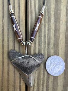 1 15/16 inch Fossilized Megalodon Shark Tooth Necklace featuring Brown Bones With X Design