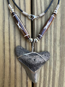 1 15/16 inch Fossilized Megalodon Shark Tooth Necklace featuring Brown Bones With X Design