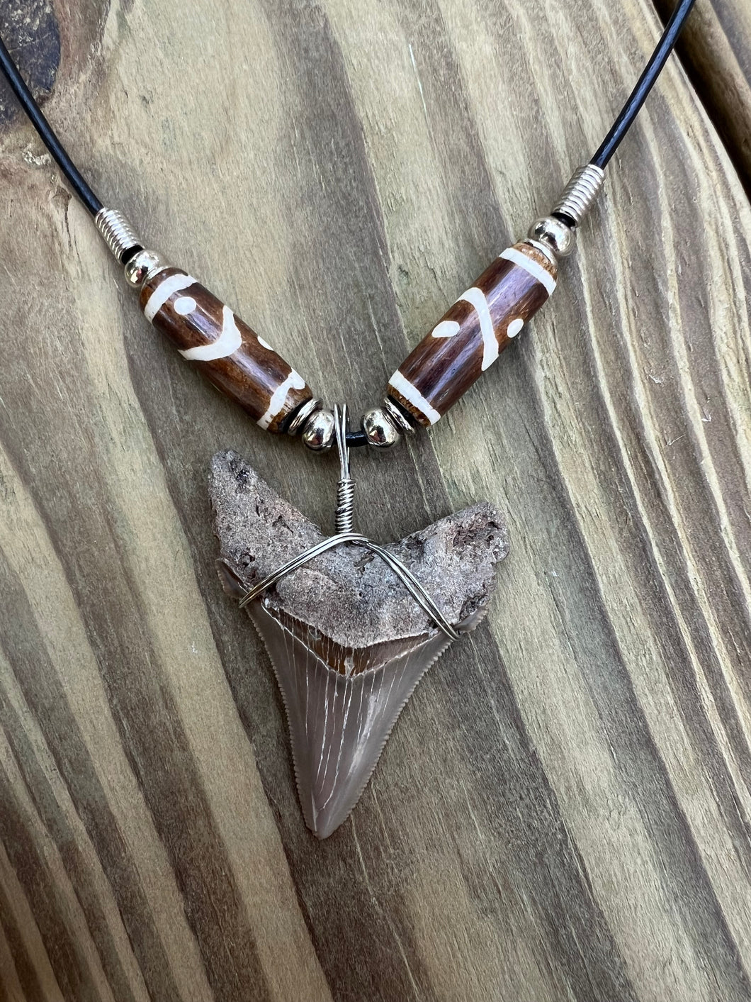 2 inch Fossilized Angustiden Shark Tooth Necklace featuring Brown Bones With Yin and Yang Design