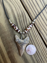 Load image into Gallery viewer, 2 inch Fossilized Angustiden Shark Tooth Necklace featuring Brown Bones With Yin and Yang Designs
