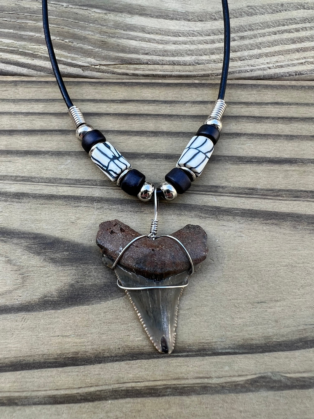 1 3/8 inch Fossilized Angustiden Shark Tooth Necklace featuring Black and White Beads